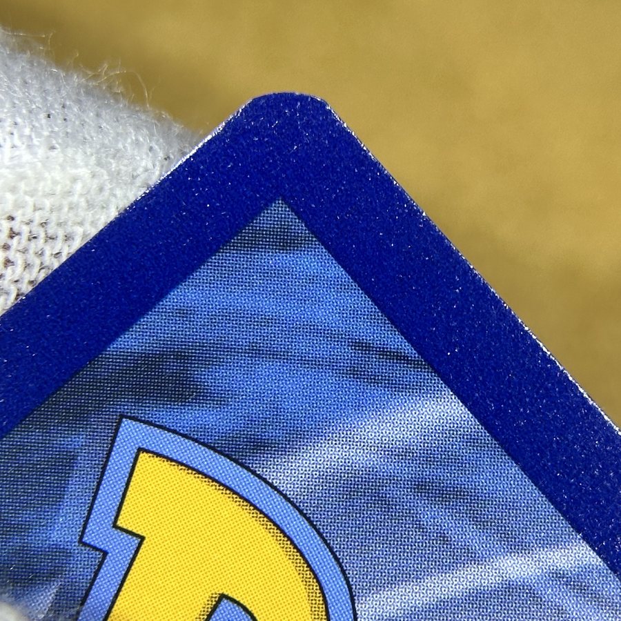 Same English Pokémon card after edge whitening repair by Pokejem