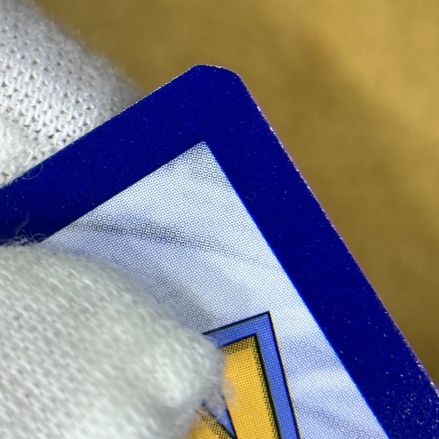 English Pokémon card before edge whitening repair